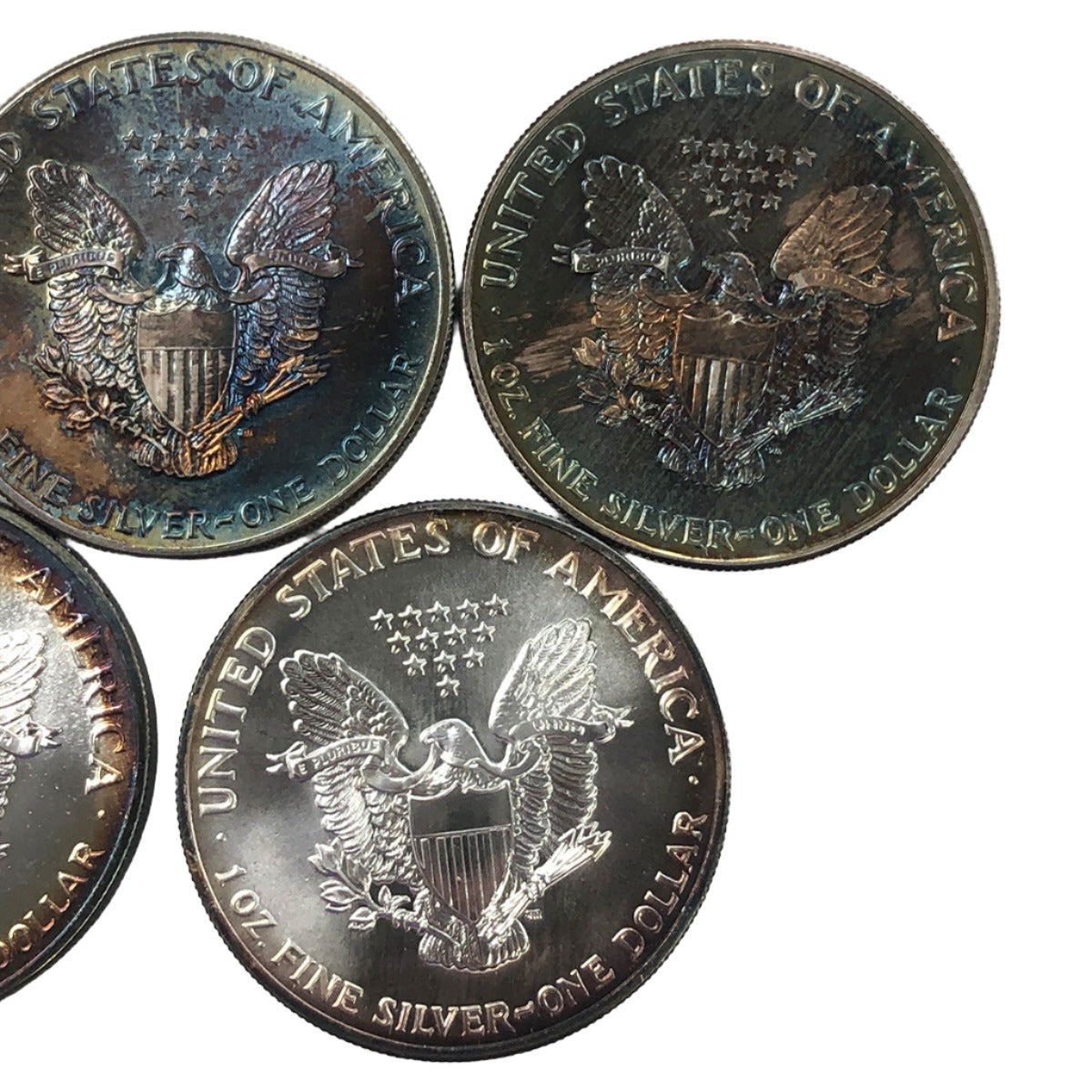 Lot of 5 Toned 1 oz American Silver Eagles