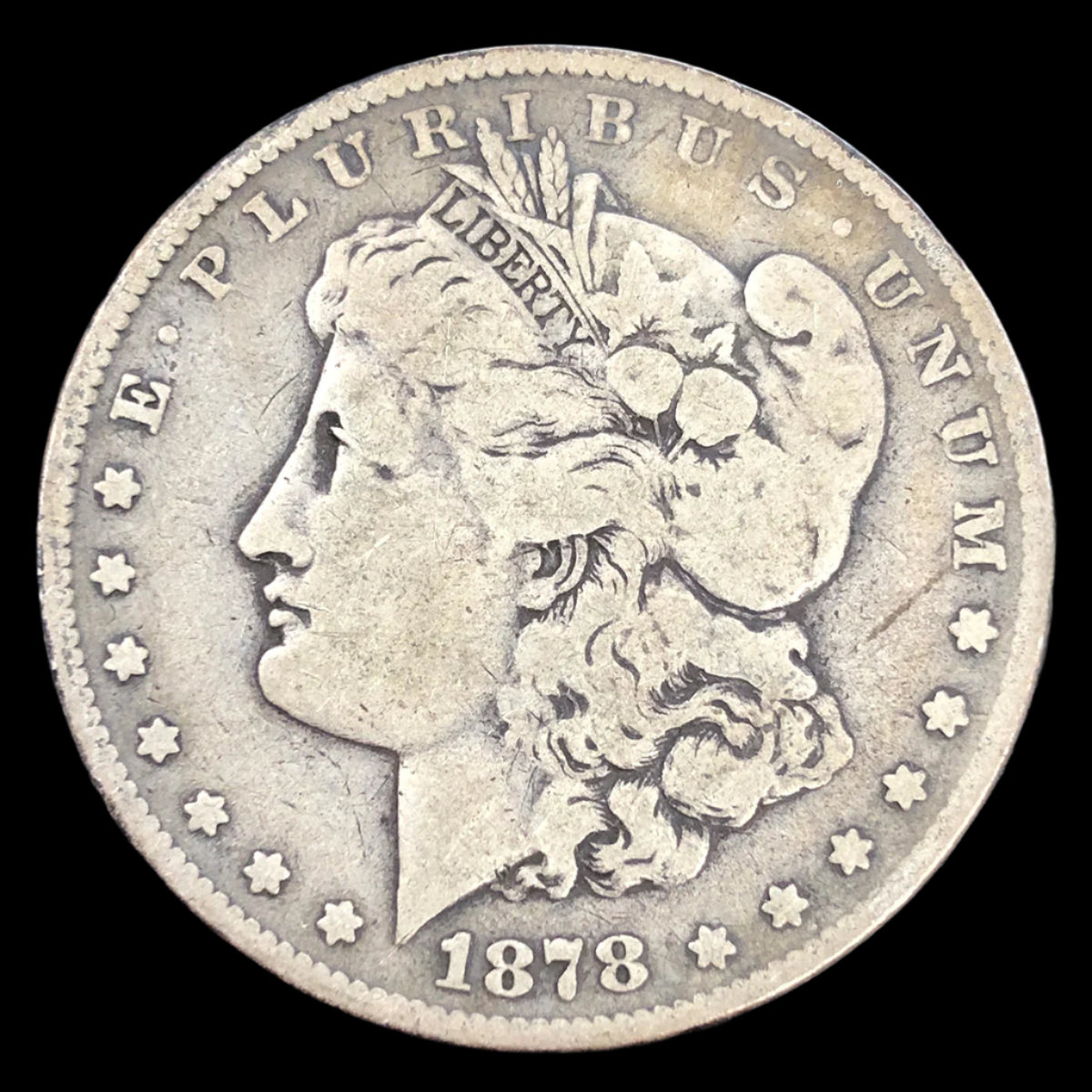 1878 7 Tail Feather Morgan Silver Dollar (VG)