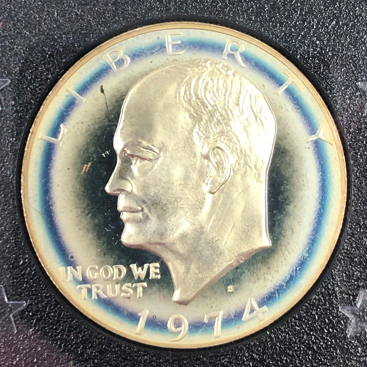 Sold toned silver ike dollars