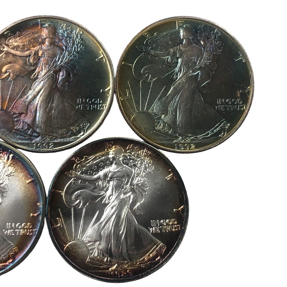 Lot of 5 Toned 1 oz American Silver Eagles