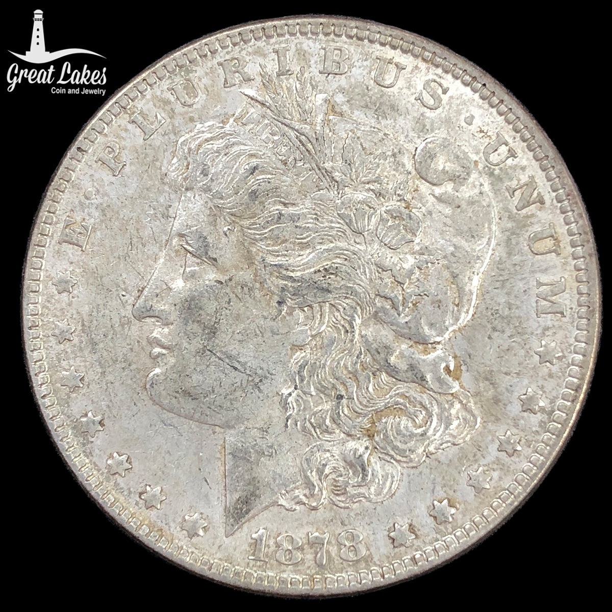 1878 7 Tail Feather Morgan Silver Dollar (AU)