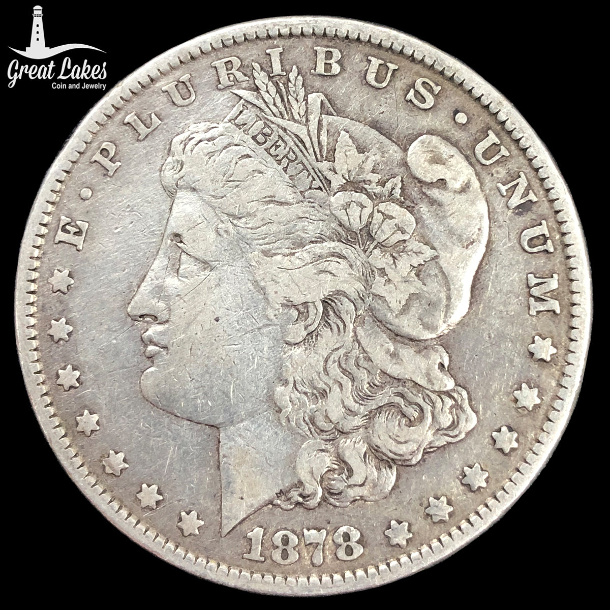 1878 7 Tail Feather Morgan Silver Dollar (VF) (Cleaned)