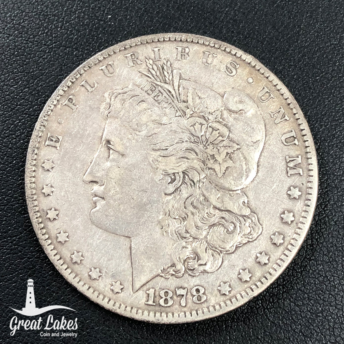 1878 7 Tailfeather Morgan Silver Dollar (VF / XF)