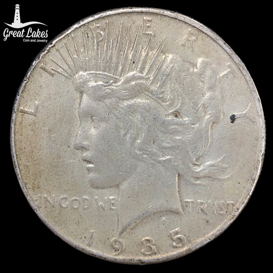 1935 Peace Silver Dollar (XF) (Scratches on Reverse)