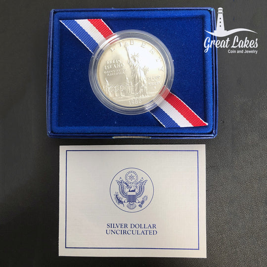 1986-P $1 Statue of Liberty “Ellis Island” Uncirculated Commemorative Dollar (With Box & CoA)